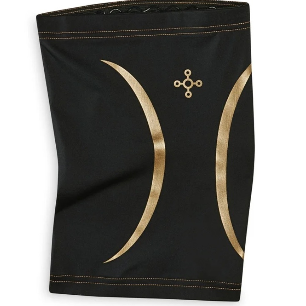 Tommy Cooper compression sleeve .
Black and gold NWOT
